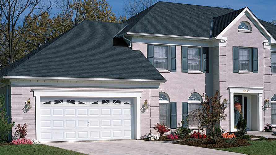 Traditional Colonial white garage door with windows
